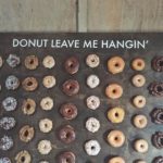 A metal Doughnut tray filled with Quinceanera donuts with the phrase 'donut leave me hangin'on it.