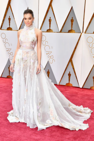 Quinceanera: Emma Stone, a woman in a white dress on a red carpet at the Oscars 2017