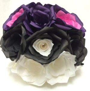 A beautiful bouquet of black garden roses, perfect for a Quinceanera celebration