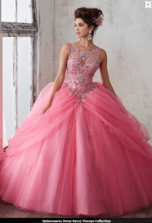 Quinceañera dresses for women, a woman in a pink dress posing for a picture