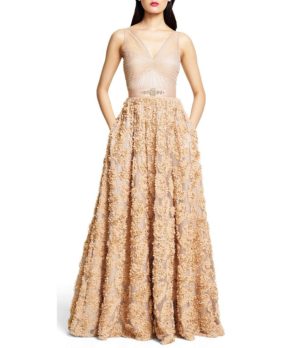 Quinceanera Gown, a woman in a long dress standing in front of a white background