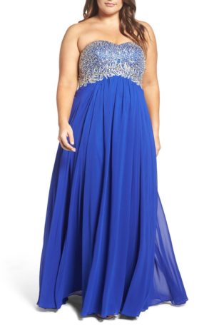A woman in a blue Quinceanera gown