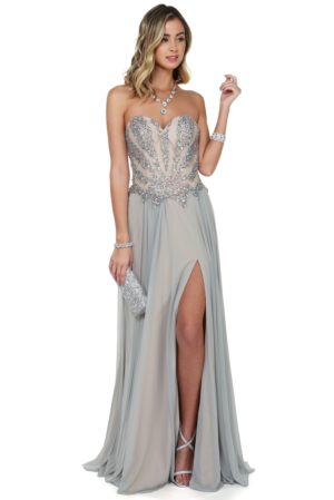 Image of a woman wearing a grey Quinceanera gown with a slit