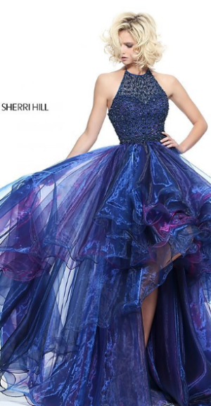 Quinceanera gown: a woman in a blue and purple dress