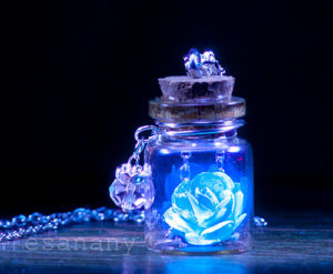 blue glowing rose Earring