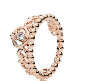 Quinceanera Pandora crown ring, a rose gold ring with a diamond.