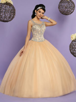 A woman in a Quinceanera ball gown posing for a picture