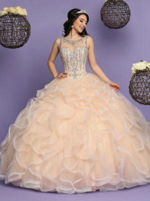 Classic Quinceanera dresses: a woman in a ball gown posing for a picture