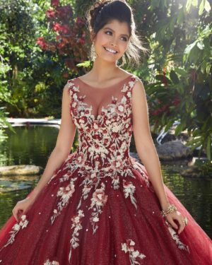 Quinceanera Gown, a woman in a red ball gown standing in front of a pond