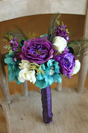 Quinceanera floral bouquet, a beautiful arrangement of purple and white flowers on a chair