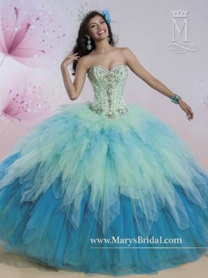 Green and blue ombre Quinceañera dress, a woman wearing a blue and green dress