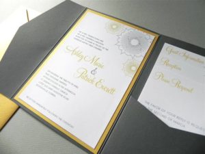 A close up of a Quinceanera invitation on a table