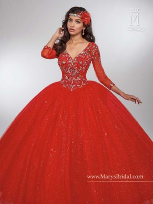Quinceanera - A woman in a red ball gown posing for a picture