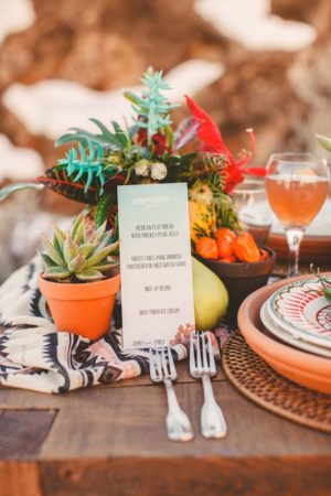 A Quinceanera brunch, a table set with plates and utensils