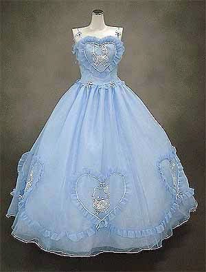 A blue Quinceanera dress featuring a heart design, inspired by the Hello Kitty theme