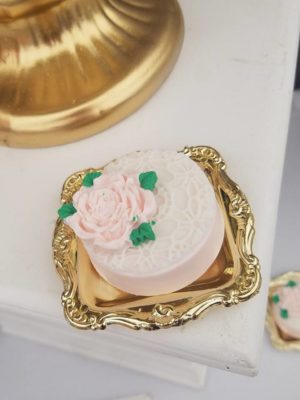Quinceanera theme image featuring jewellery Party, a cake and cookies on a gold tray