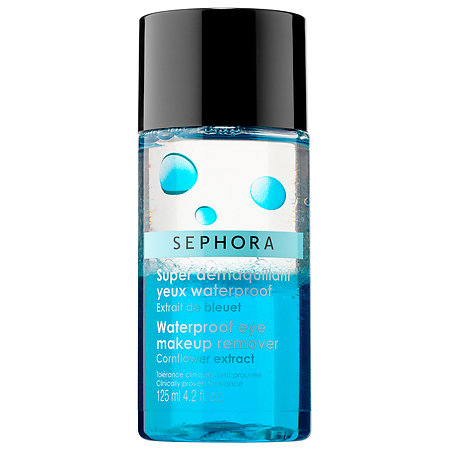 A close-up of a bottle of SEPHORA makeup remover on a white background