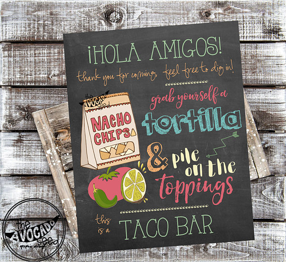 A Quinceanera themed image featuring nachos and a chalkboard sign with a variety of food items.