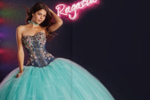 A woman in a gown posing for a picture in Quinceañera dresses