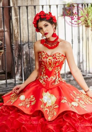 A woman wearing a red and gold gown Quinceañera dress