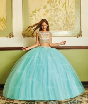 Quinceañera dresses, a beautiful young woman in a blue ball gown