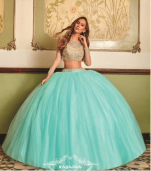 A woman in a Quinceañera ball gown posing for a picture