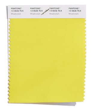 A beautiful Quinceanera dress in a vibrant shade of pantone ripe lemon, swathed in layers of flowing fabric, perfect for a Quinceanera celebration.