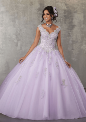Morilee Valencia Quinceanera by Morilee Dress 60033, a woman in a purple ball gown posing for a Quinceanera picture