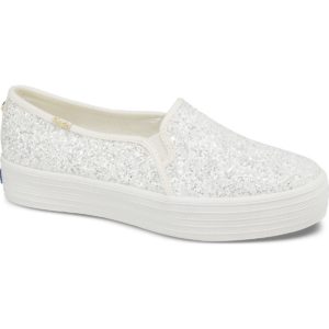 A white slip on sneaker for Quinceanera, featuring a women's walking shoe