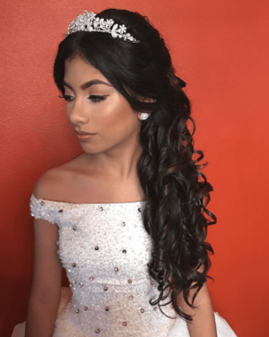 Quinceanera, a woman in a wedding dress with a tiara at the Faraday Museum at the Royal Institution of GB