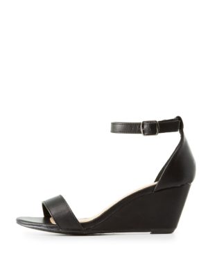 Quinceanera Sandal: A women's wedge sandal in black leather