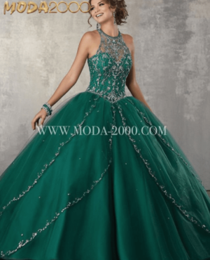Quinceañera dresses, a woman in a green and silver dress posing for a picture