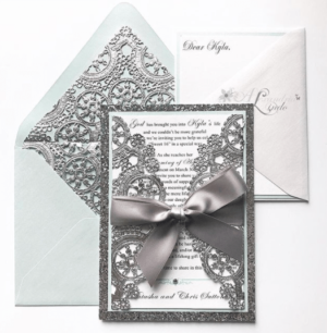Quinceanera invitation, a close up of a Quinceanera invitation on a table