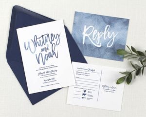 A Quinceanera invitation, a blue and white invitation with a blue envelope