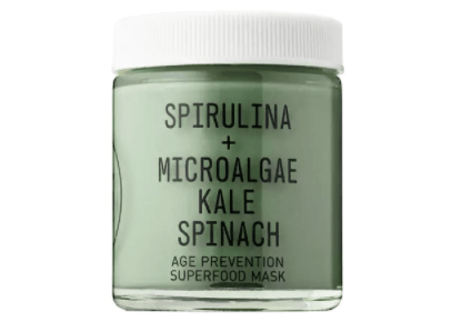 A Quinceanera-themed image featuring a jar of cream, spirulina, microalgae, kale, and spinach.
