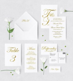 Quinceanera invitation with gold foiling and white envelopes