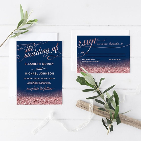 A Quinceanera invitation featuring a blue and pink design with a white envelope, decorated with olive branches