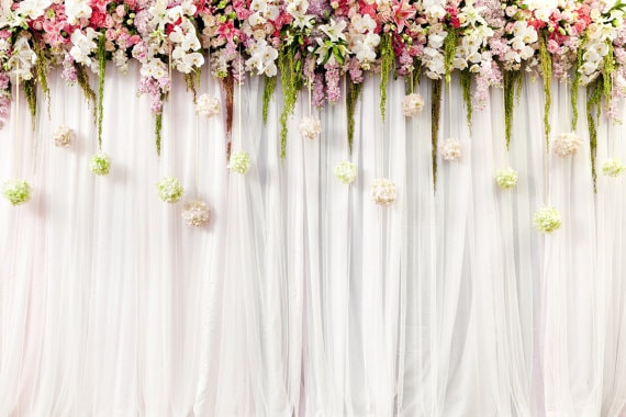 Quinceanera curtain background, a white curtain with pink and white flowers on it