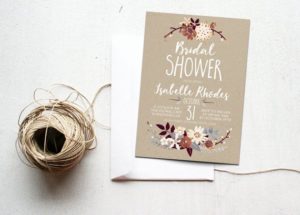 Quinceanera invitation, featuring a paper invitation with a spool of twine
