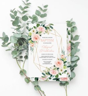 A Quinceanera invitation featuring a floral design with pink flowers and greenery