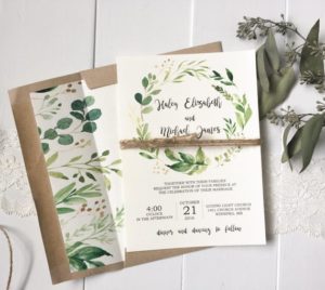 Quinceanera invitation, an invitation with greenery on it