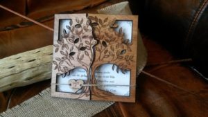 Quinceanera invitation with tree design on wooden book