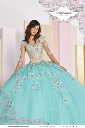 Quinceañera dresses, a woman in a shades of blue ball gown posing for a picture