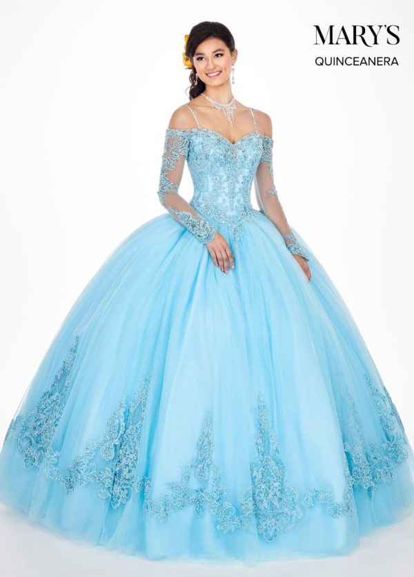 A woman wearing a baby blue Quinceañera dress, a ball gown in the color of the sky.