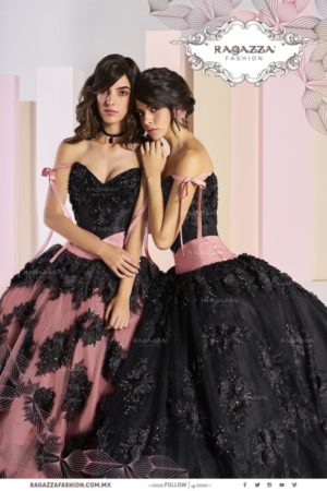 Two women in black and pink Quinceañera dresses sitting next to each other