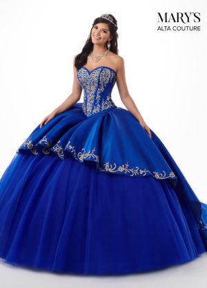 15 quinceanera dresses in royal blue and gold, a woman in a blue dress posing for a picture