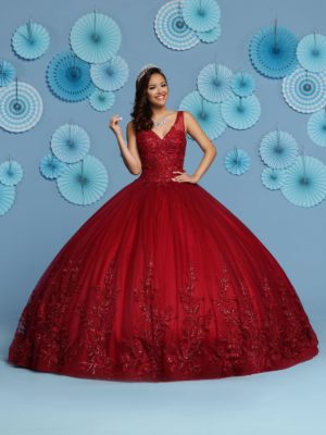 q by davinci Quinceañera dresses, a woman in a red ball gown posing for a picture