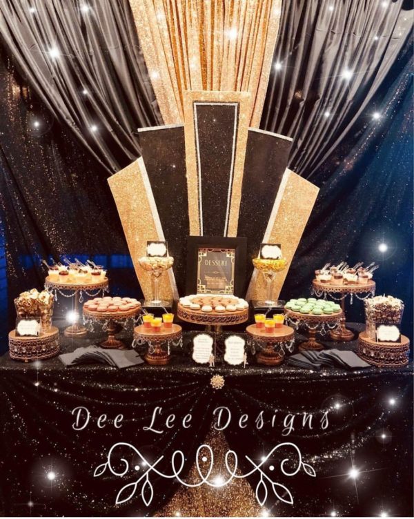 Quinceanera ceremony with a table topped with lots of desserts