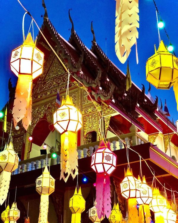 A Quinceanera celebration at landmark Fair with a bunch of paper lanterns hanging from the ceiling