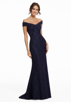 Quinceanera: A woman wearing a navy lace gown